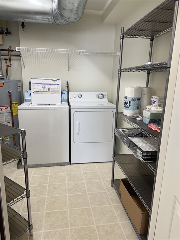 5 Mission Road, Unit 101 Chelmsford, MA 01863 - Photo 16 of 18 a utility room with dryer and washer