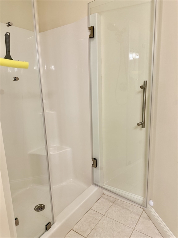 5 Mission Road, Unit 101 Chelmsford, MA 01863 - Photo 8 of 18 a bathroom with a shower