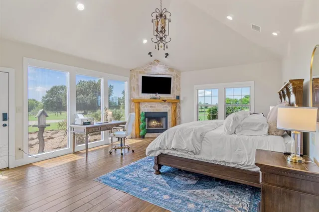 a living room with furniture fireplace and window