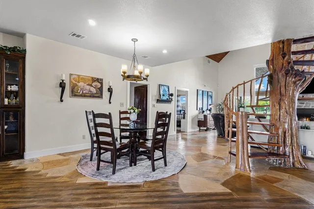 a view of a dining room with furniture
