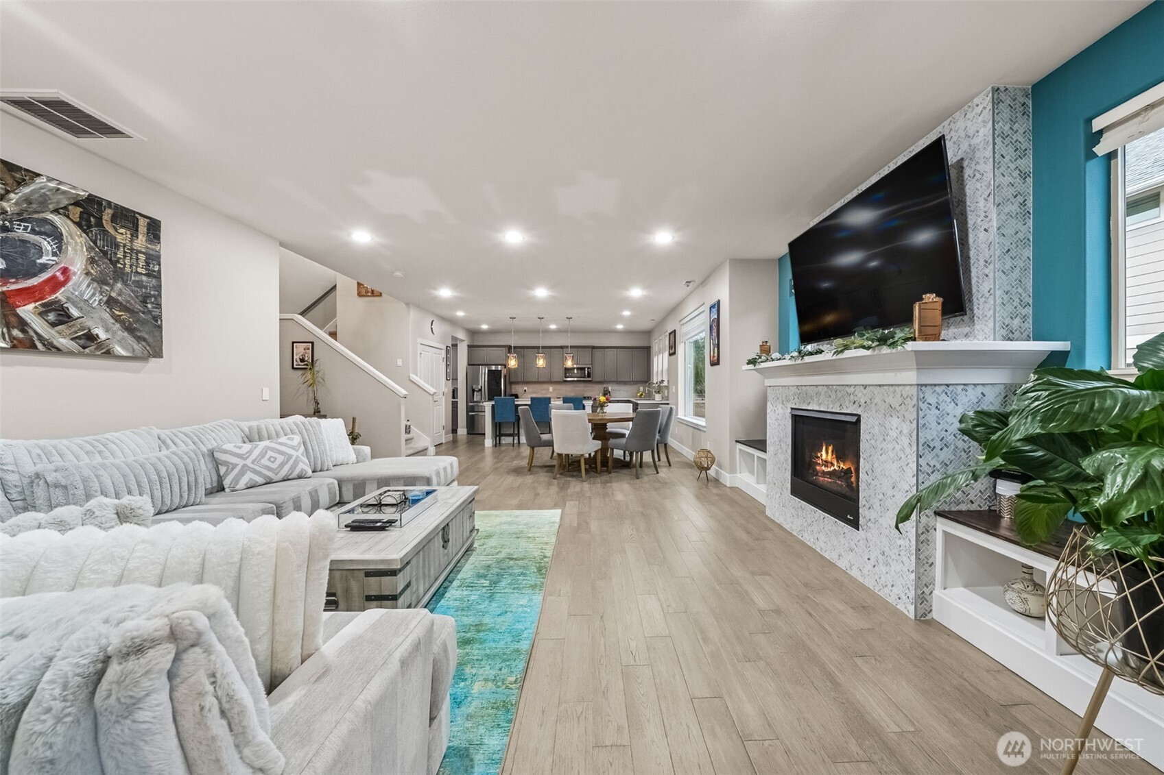 18603 134th Street East Bonney Lake, WA 98391 - Photo 14 of 39 a living room with furniture and a fireplace