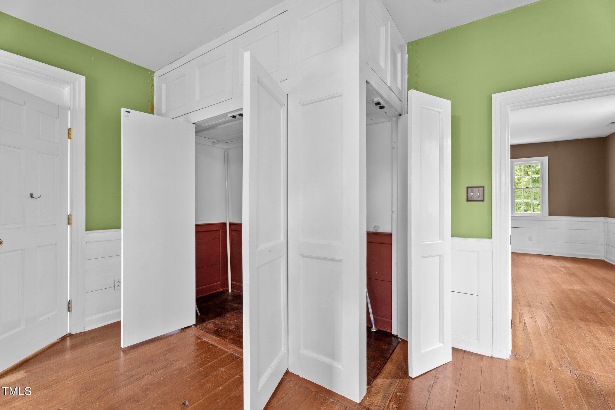 7404 Halifax Road Zebulon, NC 27597 - Photo 27 of 39 a view of hallway with wooden floor