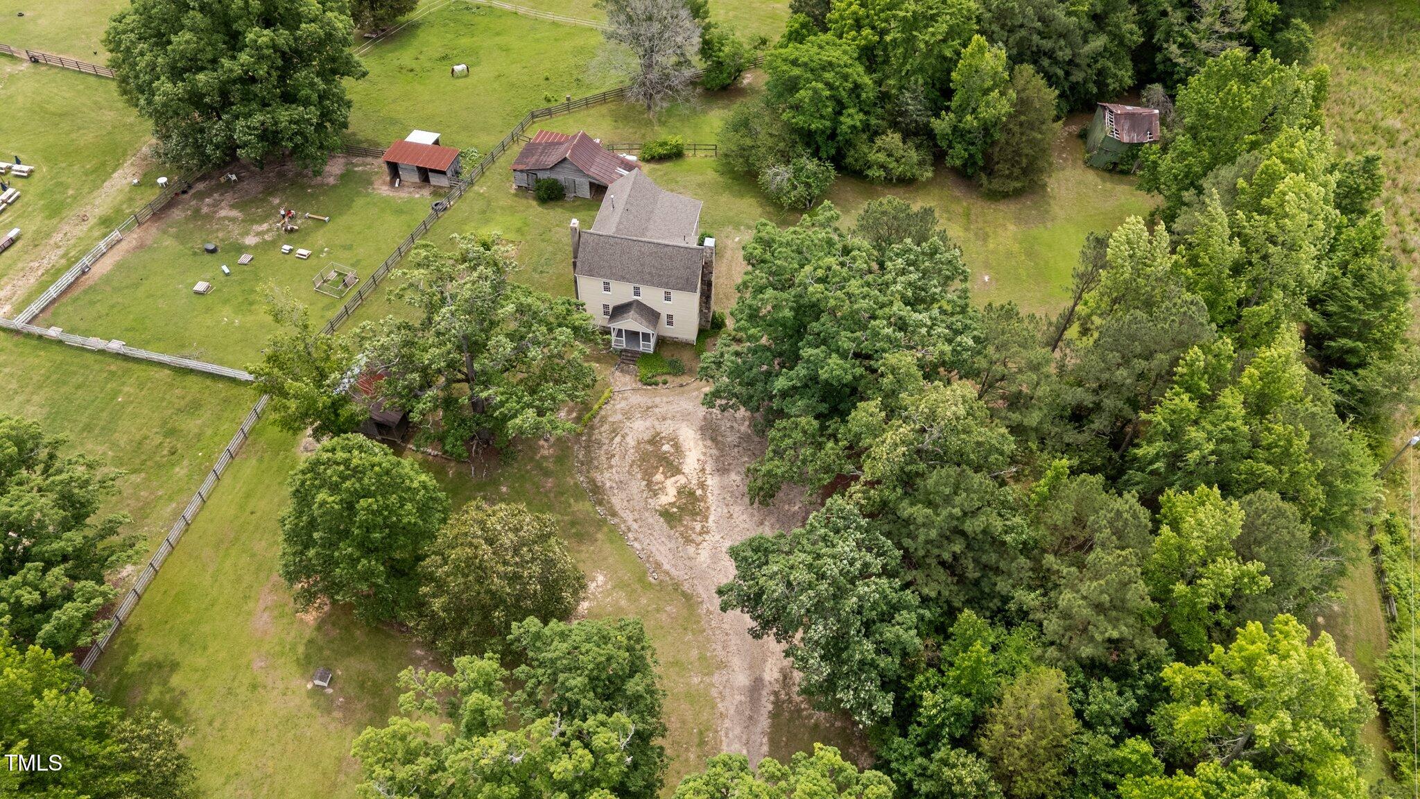 7404 Halifax Road Zebulon, NC 27597 - Photo 38 of 39 a aerial view of a house with a yard