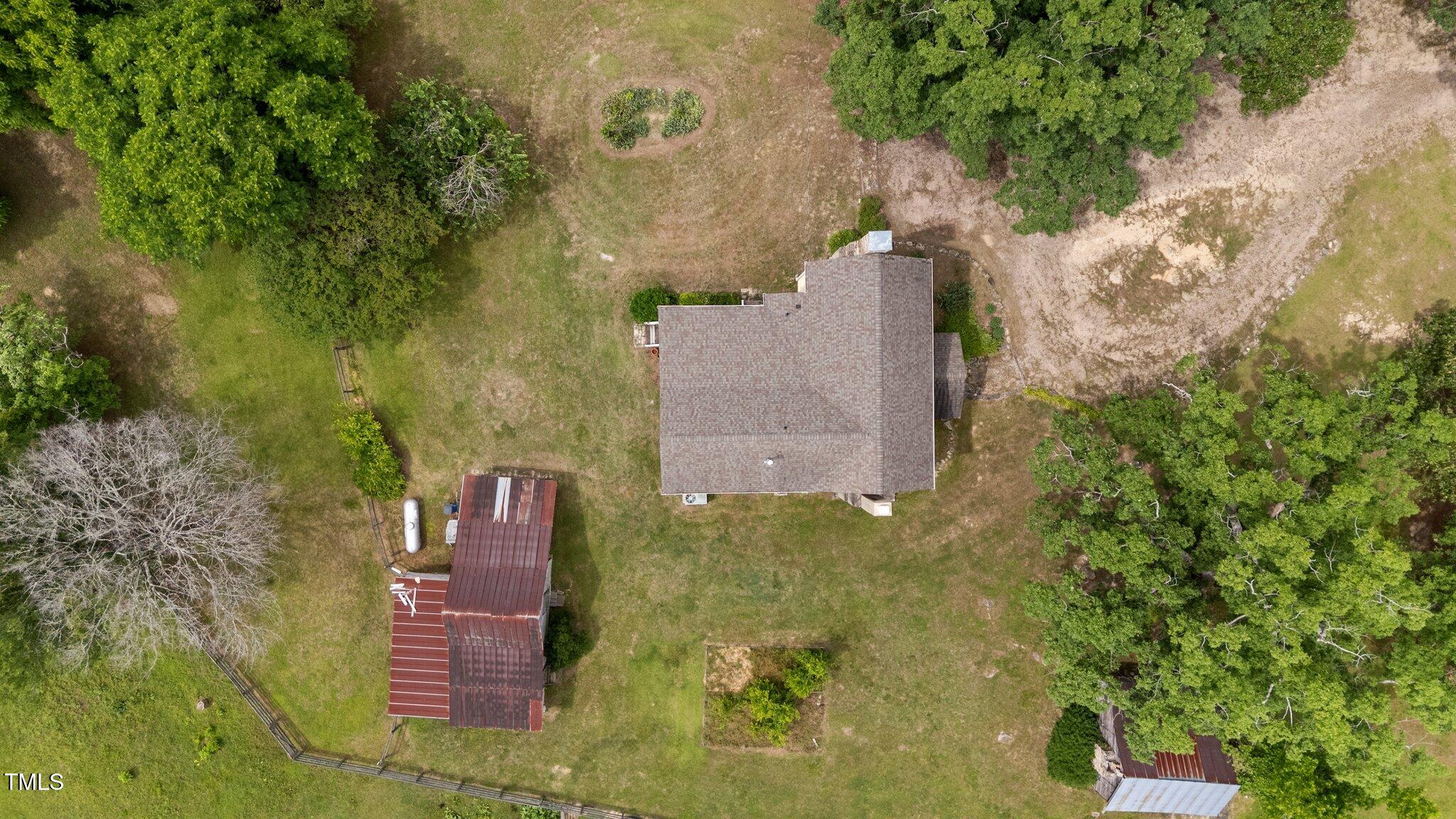 7404 Halifax Road Zebulon, NC 27597 - Photo 39 of 39 an aerial view of residential houses with outdoor space