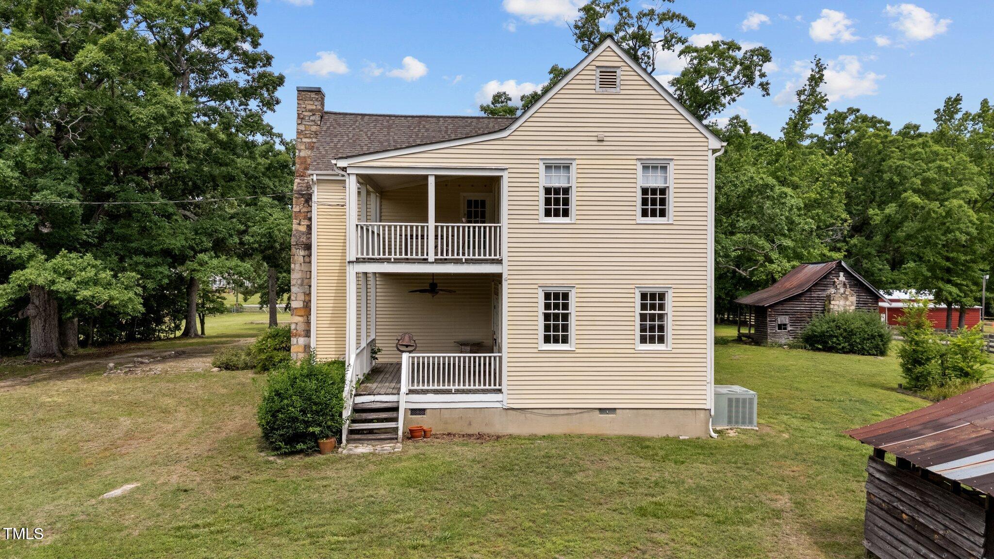 7404 Halifax Road Zebulon, NC 27597 - Photo 8 of 39 a front view of a house with a yard