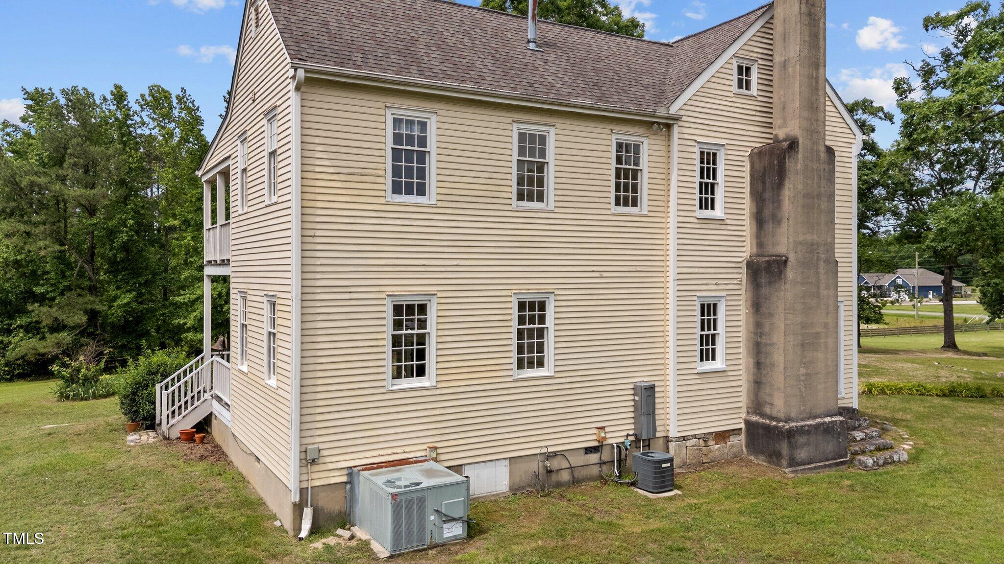 7404 Halifax Road Zebulon, NC 27597 - Photo 9 of 39 a view of a house with backyard