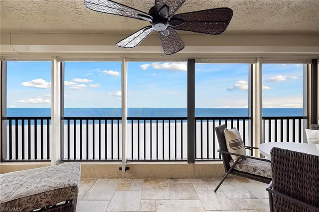 a balcony view with a outdoor seating space