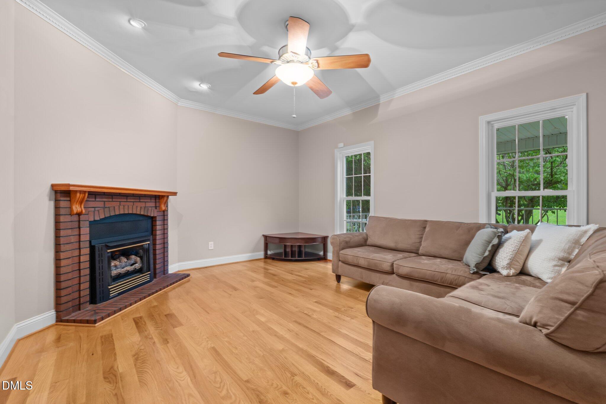 431 Patterson Ridge Lane Sanford, NC 27330 - Photo 11 of 29 a living room with furniture and a fireplace