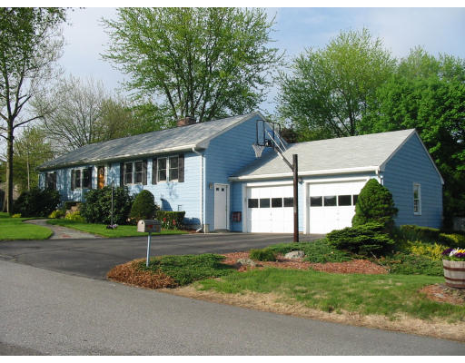 2 Anna Road Woburn, MA 01801 - Photo 1 of 6 a front view of a house with a yard and trees