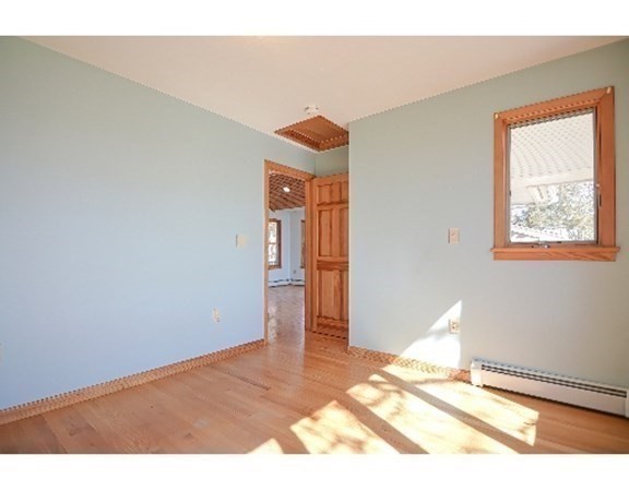 55 Lookout Point Road Plymouth, MA 02360 - Photo 17 of 42 a view of a bedroom with wooden floor and closet