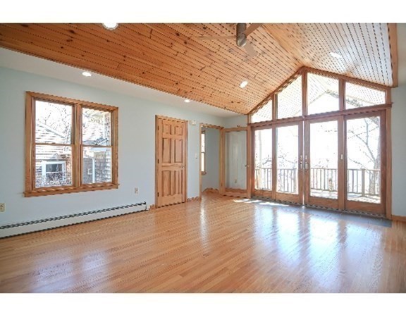 55 Lookout Point Road Plymouth, MA 02360 - Photo 21 of 42 a view of an empty room with wooden floor and a window