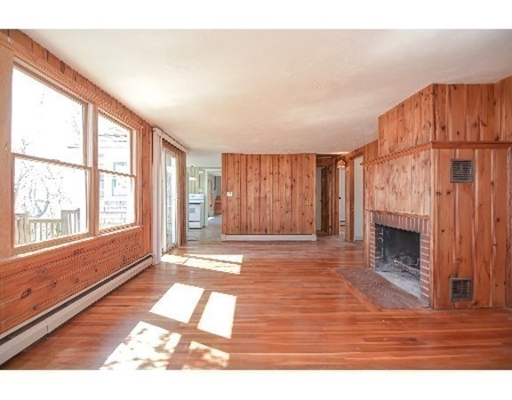 55 Lookout Point Road Plymouth, MA 02360 - Photo 26 of 42 a view of an empty room with wooden floor and a window