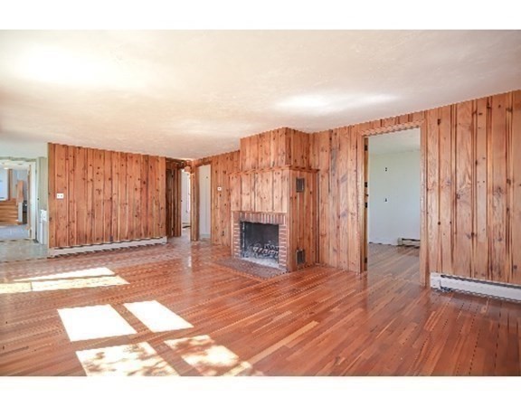 55 Lookout Point Road Plymouth, MA 02360 - Photo 29 of 42 a view of an empty room with wooden floor and a window