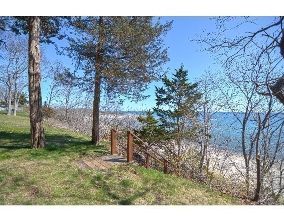 55 Lookout Point Road Plymouth, MA 02360 - Photo 39 of 42 a backyard of a house with lots of green space