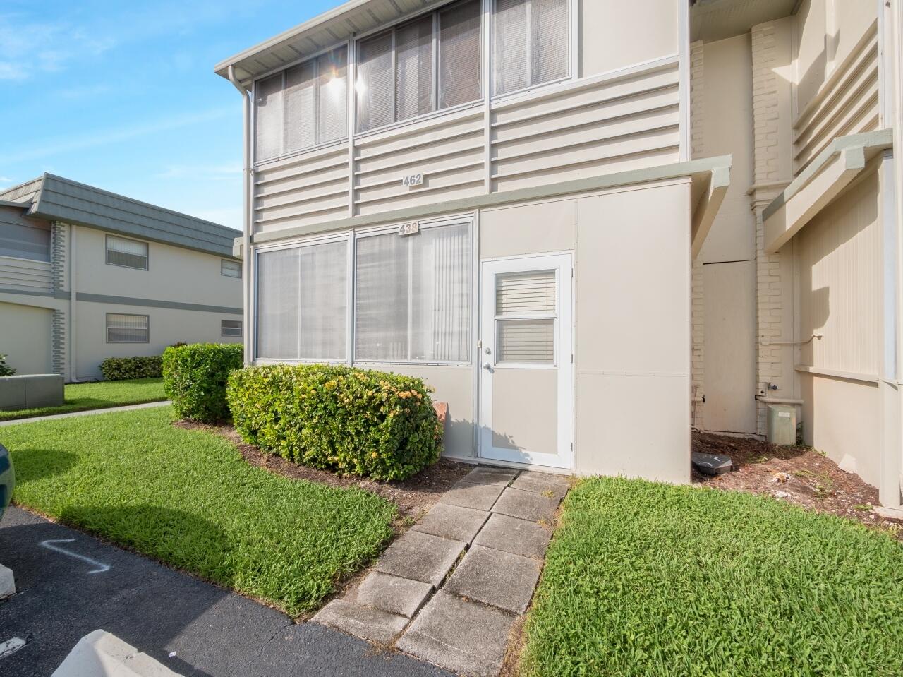 438 Monaco J Delray Beach, FL 33446 - Photo 12 of 15 a view of a back yard of a house