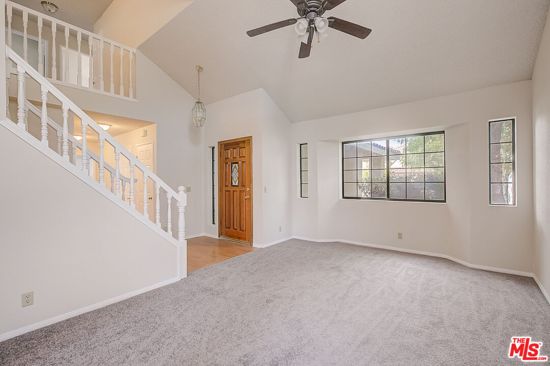 2535 West Ave K9 Lancaster, CA 93536 - Photo 11 of 35 a view of an empty room with chandelier fan
