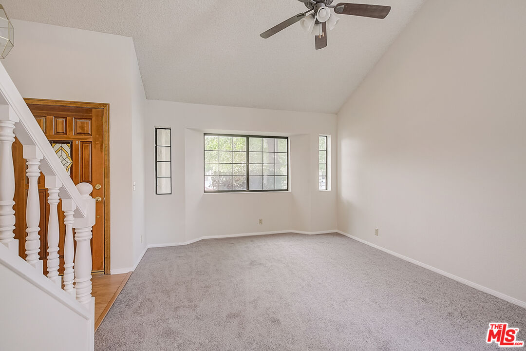 2535 West Ave K9 Lancaster, CA 93536 - Photo 13 of 35 an empty room with windows