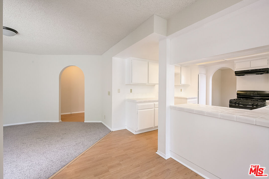 2535 West Ave K9 Lancaster, CA 93536 - Photo 21 of 35 a view of a kitchen with a sink