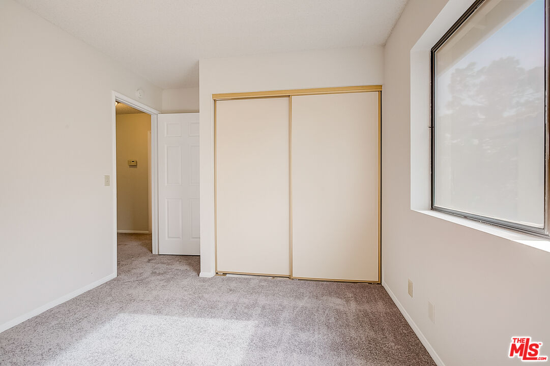 2535 West Ave K9 Lancaster, CA 93536 - Photo 28 of 35 a view of an empty room with a window