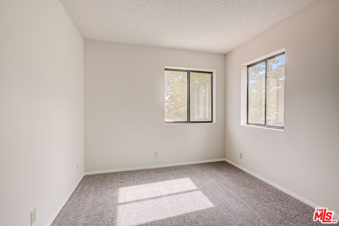 2535 West Ave K9 Lancaster, CA 93536 - Photo 30 of 35 an empty room with windows