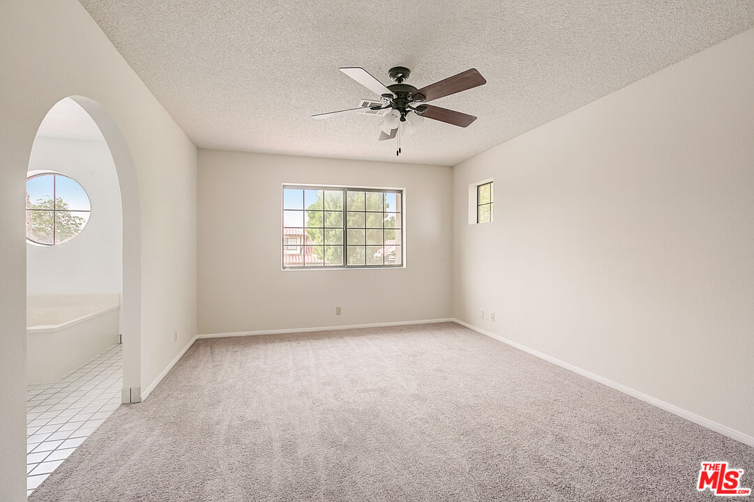 2535 West Ave K9 Lancaster, CA 93536 - Photo 32 of 35 a view of an empty room with a window