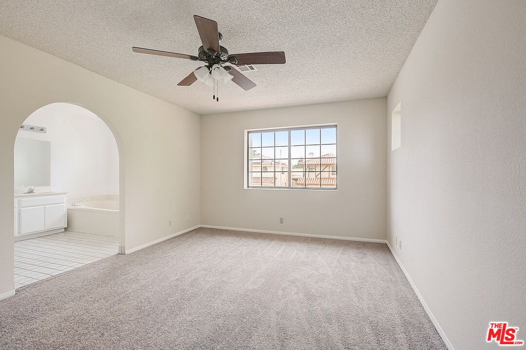 2535 West Ave K9 Lancaster, CA 93536 - Photo 8 of 35 a view of an empty room with a window