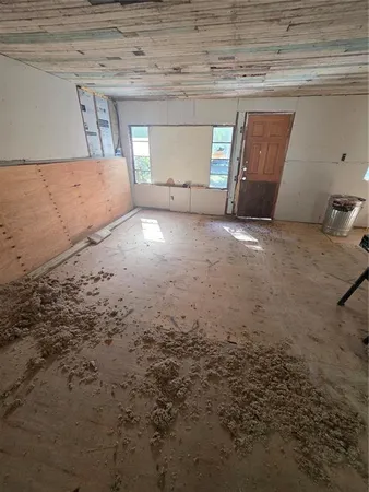 a room with furniture and windows