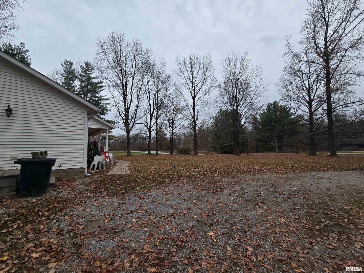 11882 Goshen Meadows Mount Vernon, IL 62864 - Photo 13 of 52 a view of a backyard with large trees