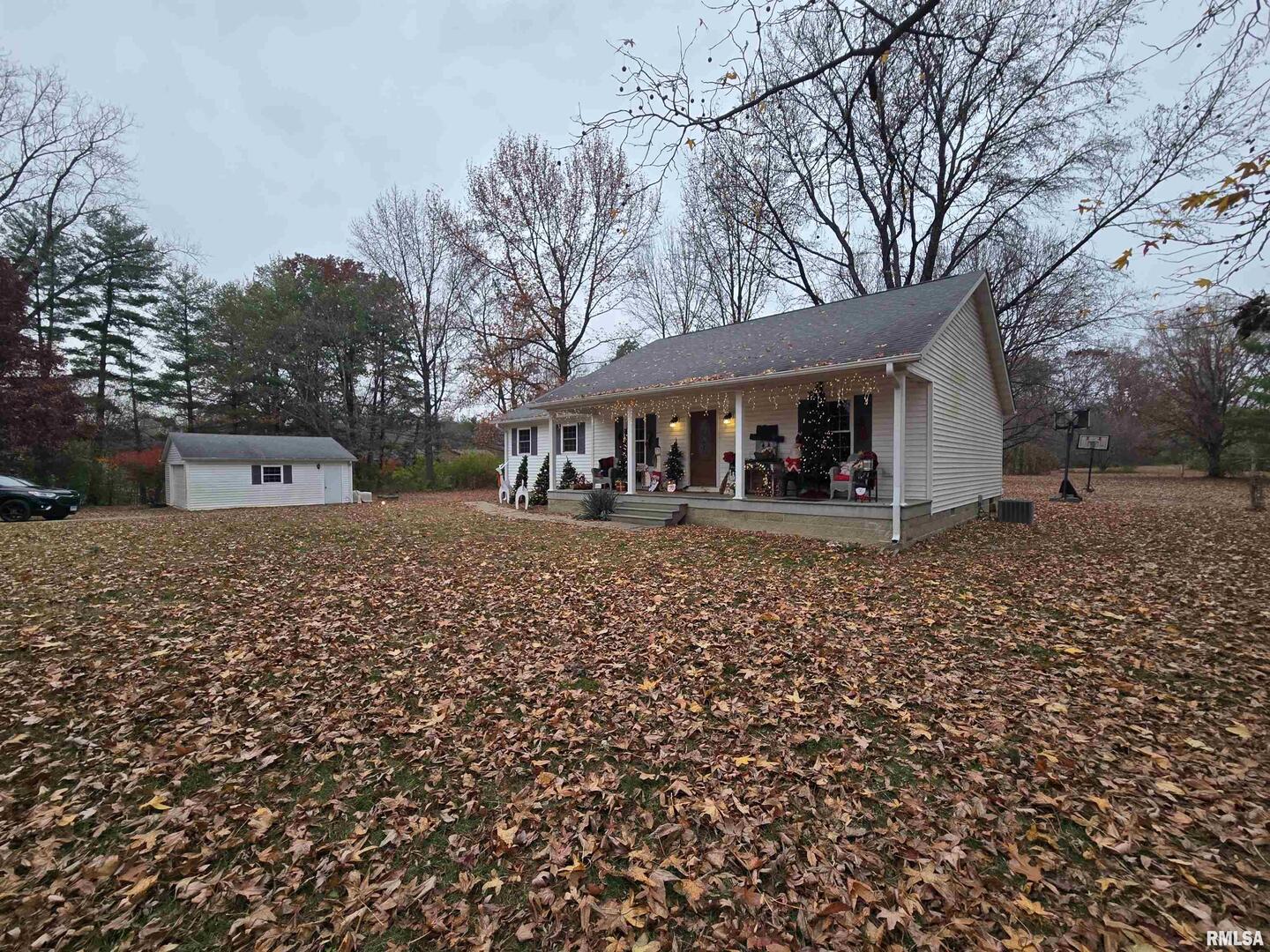 11882 Goshen Meadows Mount Vernon, IL 62864 - Photo 18 of 52 a front view of a house with a yard