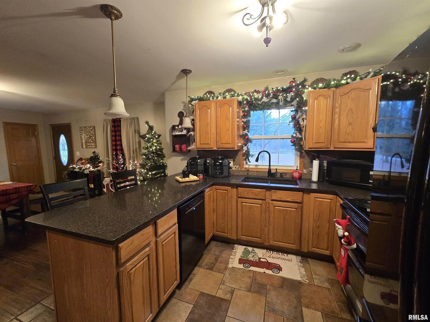 11882 Goshen Meadows Mount Vernon, IL 62864 - Photo 27 of 52 a kitchen with a sink stove and cabinets