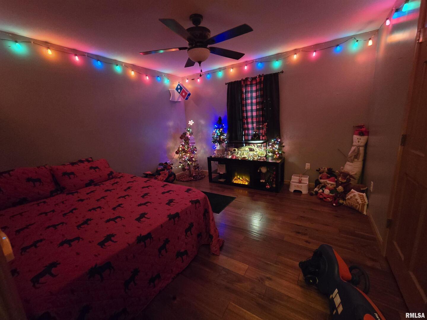 11882 Goshen Meadows Mount Vernon, IL 62864 - Photo 33 of 52 a bed room with a bed window and chandelier