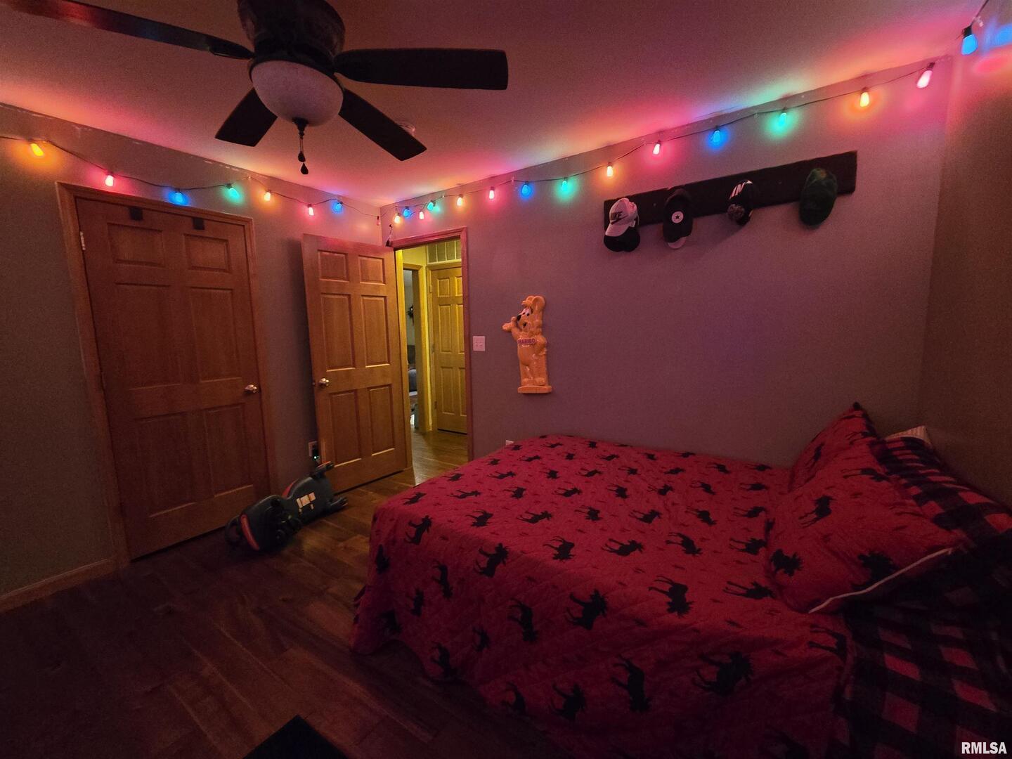 11882 Goshen Meadows Mount Vernon, IL 62864 - Photo 35 of 52 a bedroom with a bed and a chandelier