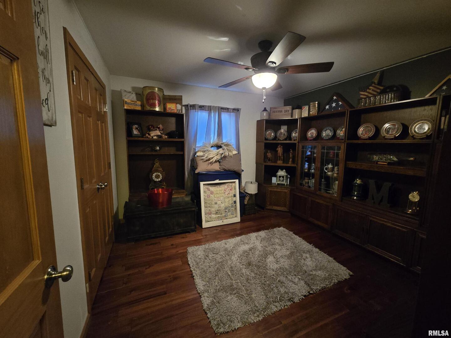 11882 Goshen Meadows Mount Vernon, IL 62864 - Photo 36 of 52 a living room with hard wood floors and a closet
