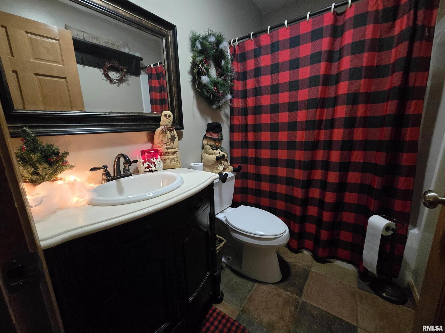 11882 Goshen Meadows Mount Vernon, IL 62864 - Photo 39 of 52 a bathroom with a sink toilet and mirror