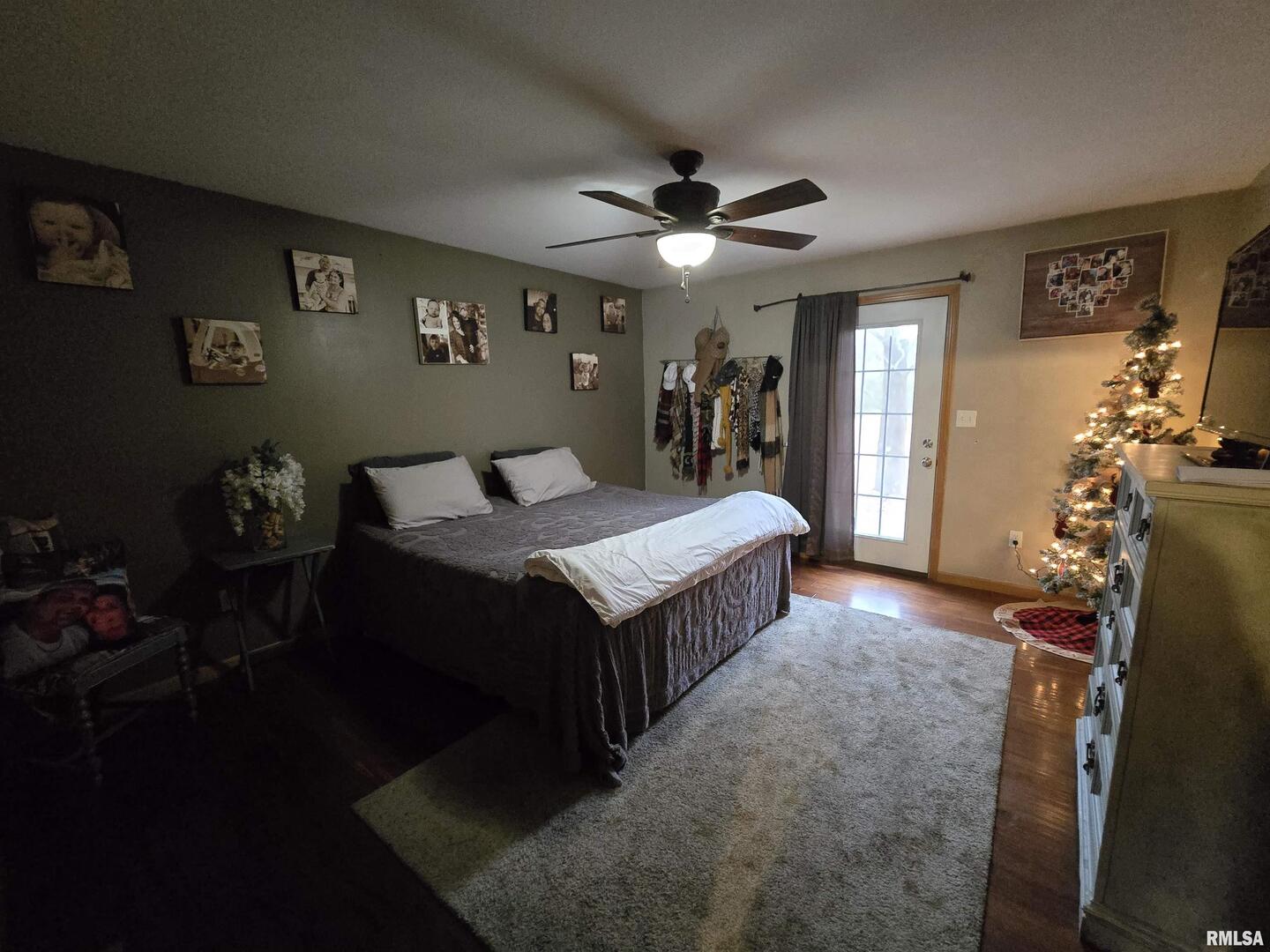 11882 Goshen Meadows Mount Vernon, IL 62864 - Photo 41 of 52 a bed room with a bed mirror and a window
