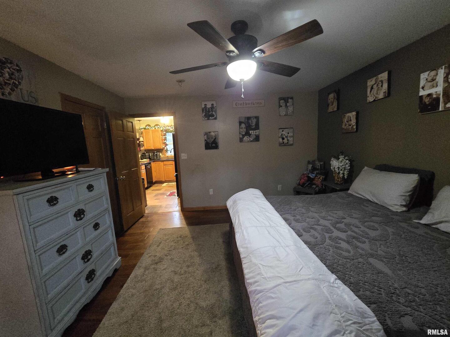 11882 Goshen Meadows Mount Vernon, IL 62864 - Photo 43 of 52 a bedroom with bed and tv on the wall