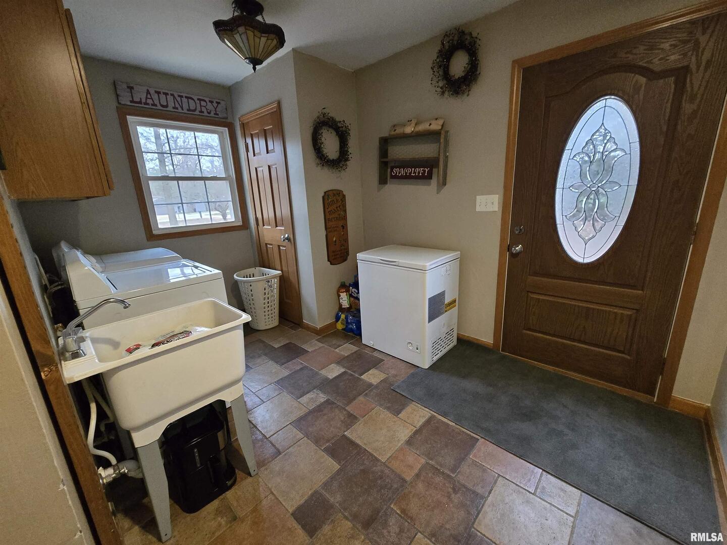 11882 Goshen Meadows Mount Vernon, IL 62864 - Photo 48 of 52 a view of a storage and utility room with washer and dryer