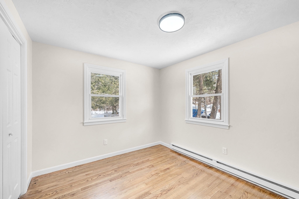 234 Roy Street Springfield, MA 01104 - Photo 8 of 29 an empty room with windows