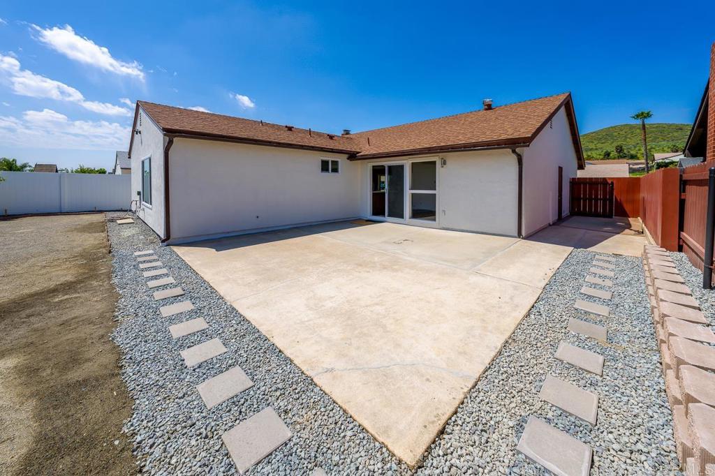 10315 Molino Road Santee, CA 92071 - Photo 15 of 19 a view of backyard of a house
