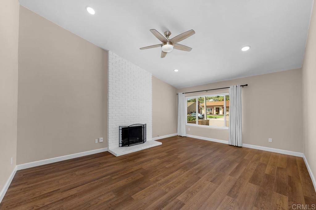 10315 Molino Road Santee, CA 92071 - Photo 2 of 19 wooden floor in an empty room with a window