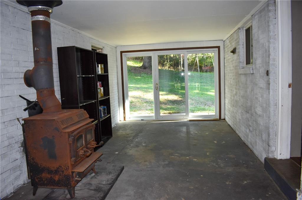 1039 Smithfield Road Smithfield, PA 15478 - Photo 13 of 16 a kitchen with windows and cabinet
