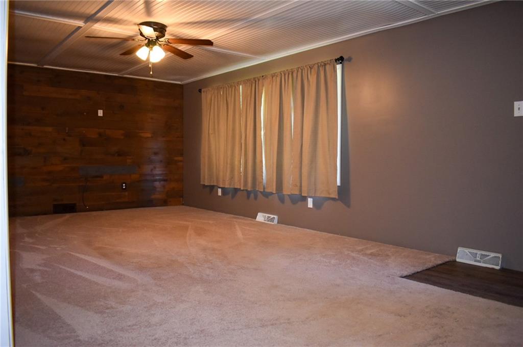 1039 Smithfield Road Smithfield, PA 15478 - Photo 7 of 16 a view of an empty room with a window