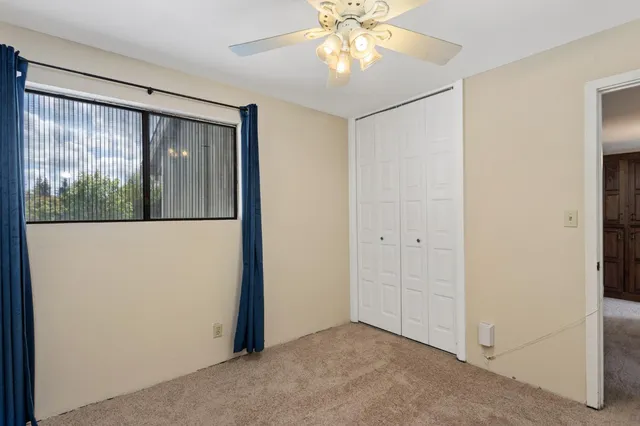 a view of a room with a large window