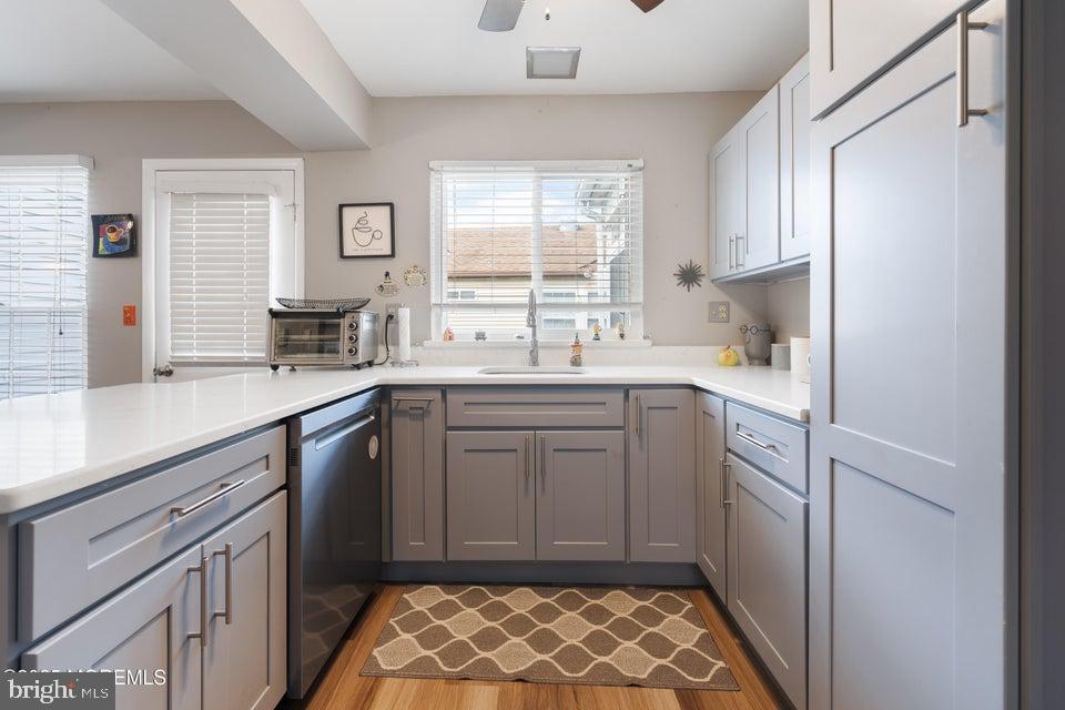 73 Red Hill Road Manchester Township, NJ 08759 - Photo 12 of 25 a kitchen with a sink stove and cabinets