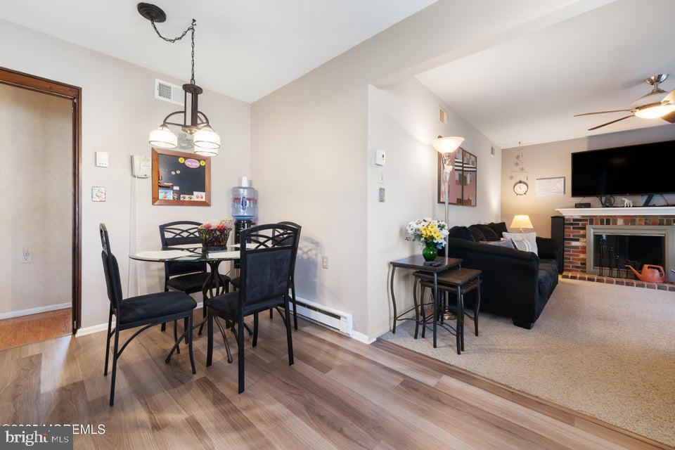 73 Red Hill Road Manchester Township, NJ 08759 - Photo 13 of 25 a view of a dining room with furniture window and wooden floor