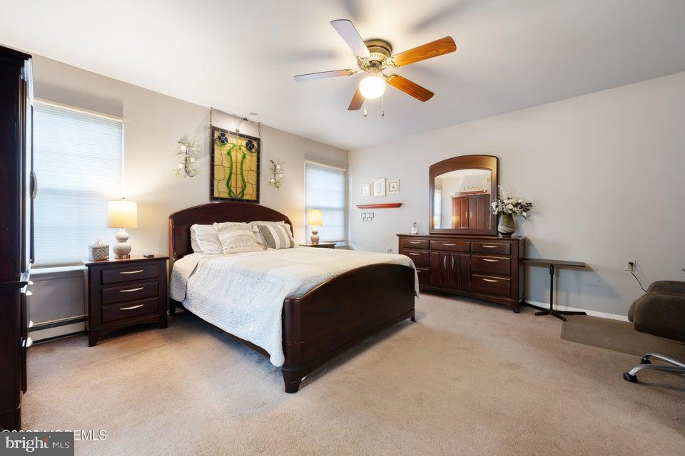 73 Red Hill Road Manchester Township, NJ 08759 - Photo 20 of 25 a bedroom with a bed dresser and a window