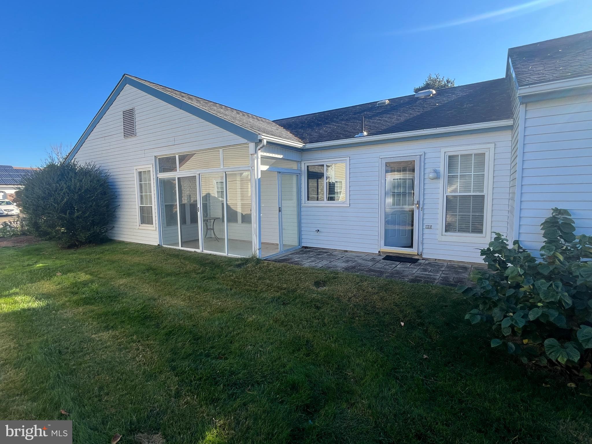 73 Red Hill Road Manchester Township, NJ 08759 - Photo 24 of 25 a view of front of a house with a yard
