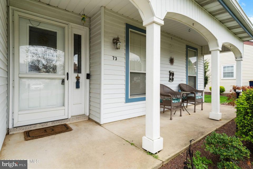 73 Red Hill Road Manchester Township, NJ 08759 - Photo 4 of 25 a view of entryway and hall with dining area