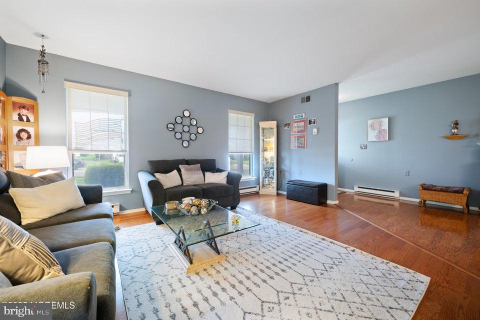 73 Red Hill Road Manchester Township, NJ 08759 - Photo 6 of 25 a living room with furniture and a table