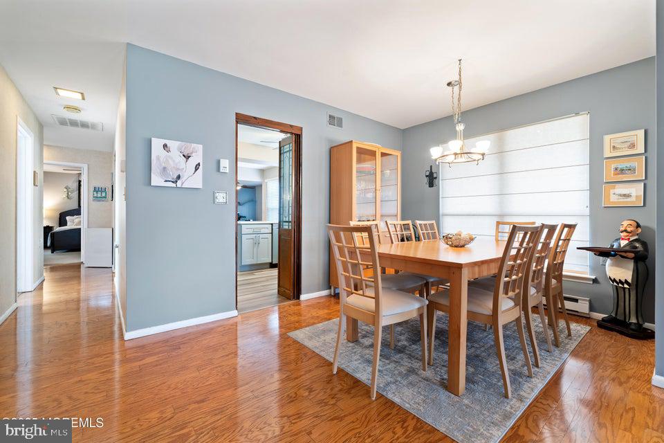 73 Red Hill Road Manchester Township, NJ 08759 - Photo 9 of 25 a view of a dining room with furniture window and wooden floor